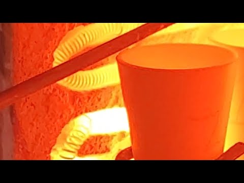 Doing a fire assay to determine precious metal content