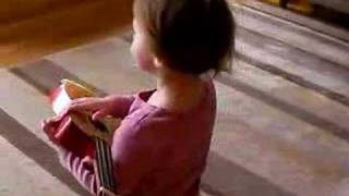 She's singing a Dan Zanes song callled "Sidewalks of NY"