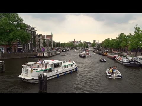 Boating on the Amsterdam Canals / summertime