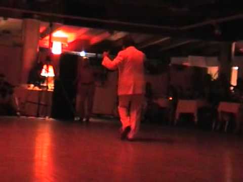  María del Carmen Romero  and  Jorge Dispari  are  dancing  to  the  tango  "  Malvon  "