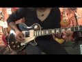 Paul Sanchez playing black Les Paul guitar.