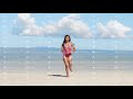 Pretty Asian Girl Jogging In Swimsuit On Sand Ocean Tropical Island Front View