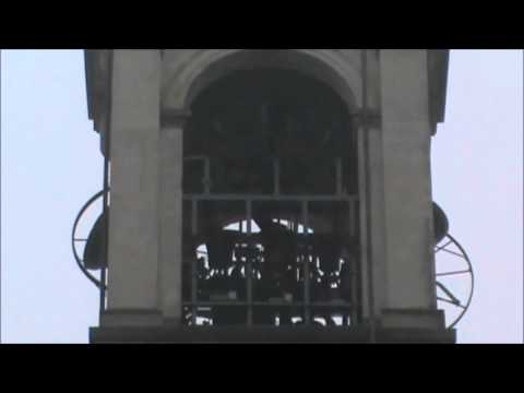The bells of the main church in Rho (Milan, Italy) ring in concert for Christmas