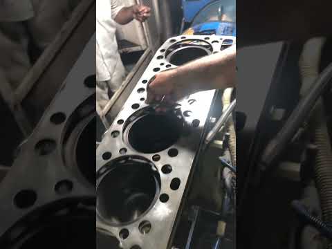 Always remember to install the O ring on oil line before installing the spacer plate Cat C15 engine