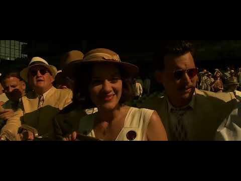 Public Enemies trailer frame with John Dillinger stepping from a vintage car, 1930s Chicago streets