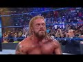 Edge Spears To Roman Reigns
