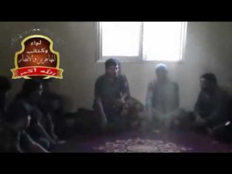 كلمة للقيب اياد قدور قائد لواء المهاجرين والانصار يوجه فيها  مجموعة من المقاتلين في معركة توحيد الصفوف