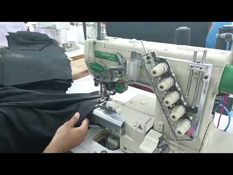 OUR MACHINE WORKS WELL IN GARMENTS FACTORY.  CYLINDER INTERLOCK 787T WITH LEFT CUTTER.