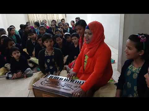Dr. Fahima Satter Jhumi Singing with Children of SunChild Home