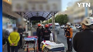 오피스텔 지하 주차장 전기차서 불...16명 이송...100여 명 대피 / YTN