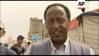 People in rebel capital react to reported deaths of Gadhafi son, grandchildren