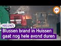 Blussen grote brand bij afvalverwerker gaat nog uren duren