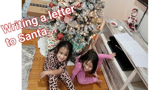 The day before Christmas eve, writing a letter to santa...