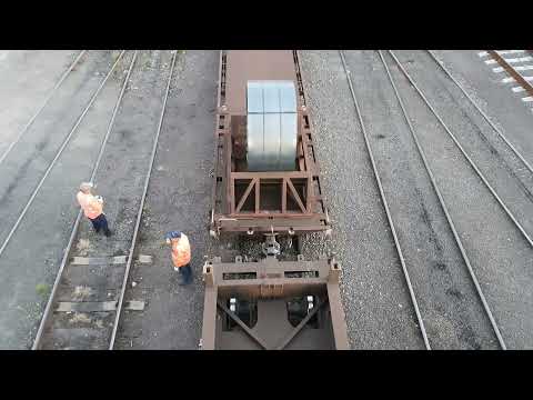 Pacific National steel services 6MW2 and 7WM2 (NR28 - NR103 - LDP007) shun around Cringila, NSW.