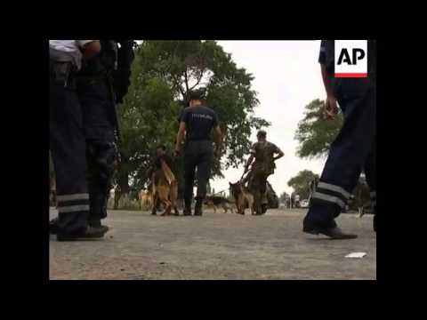 Police use tear gas and stun grenades to disperse anti-government protesters