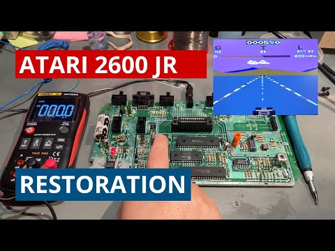 Atari 2600 jr with no audio, faulty paddles and joystick. Restoration and testing games