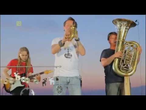 Grzech Piotrowski i One World Orchestra