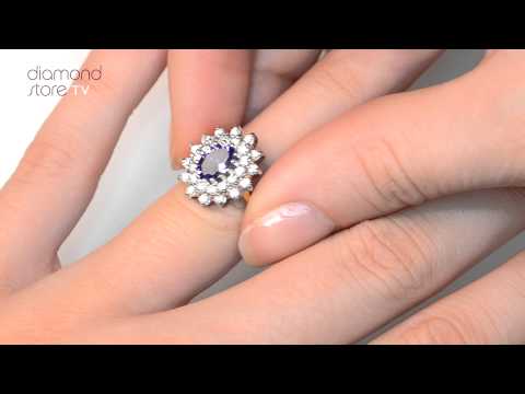 FET36 V - TANZANITE 7 X 5MM AND 0.56CT DIAMOND 18K GOLD RING