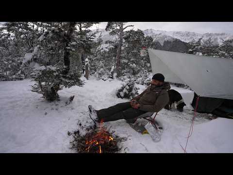 , title : 'Winter Camping in a SNOW storm - Ultra light tarp'