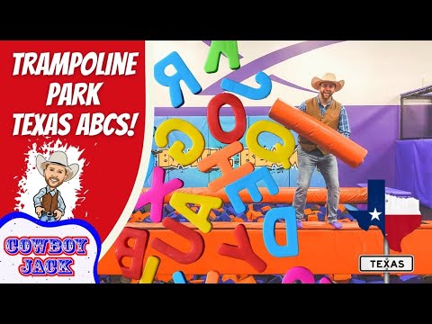 Thumbnail showing a cowboy in a hat on a trampoline obstacle course with giant colorful foam letters floating around and a Texas state badge on the right.
