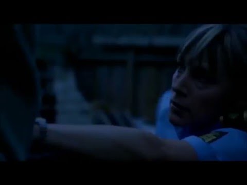 Policewoman arrests man 2