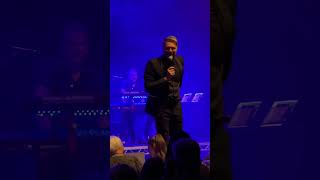 Brian McFadden stops show to say