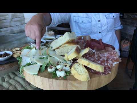 Gordo drinks wine at Veeno the Italian Wine Café in Leeds