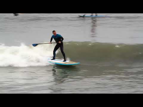 Avishai SUP surfing in Peru, in a guided surf trip with Amit Inbar