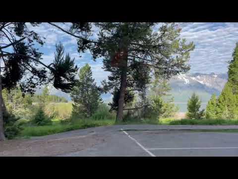 Morning view of Tetons from picnic beach at lake