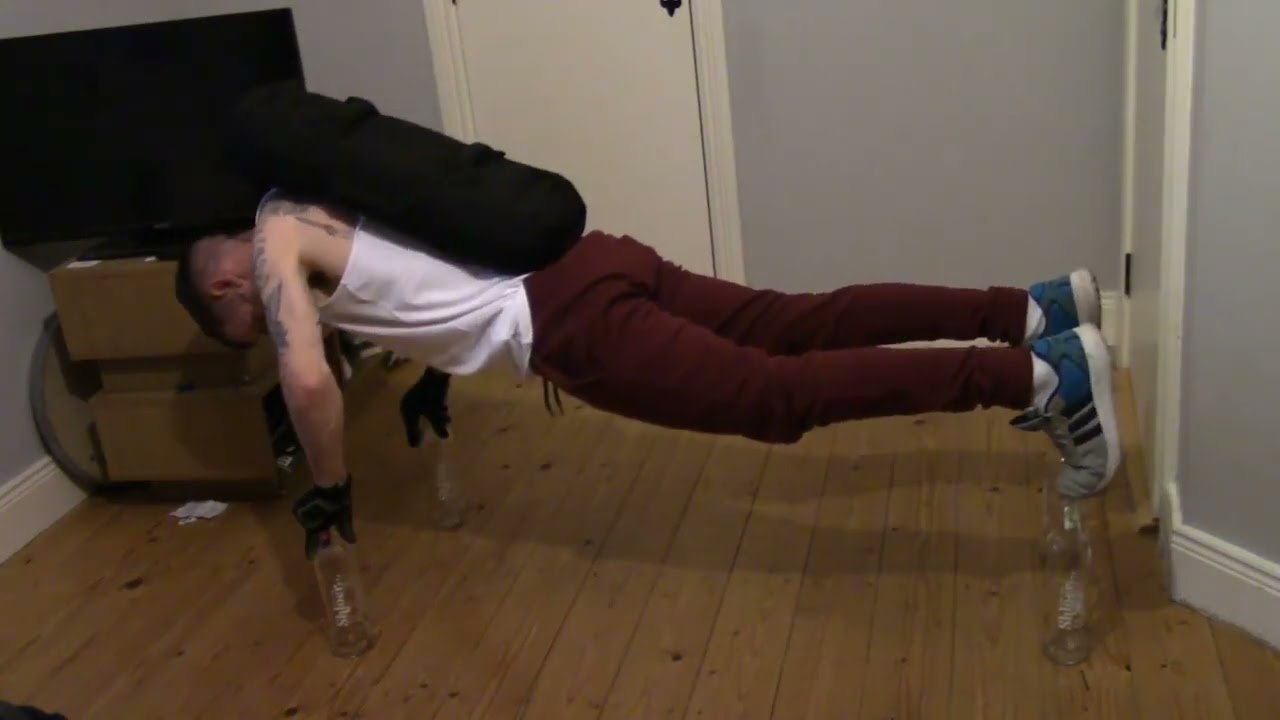 Pushups on Glass Bottles || ViralHog