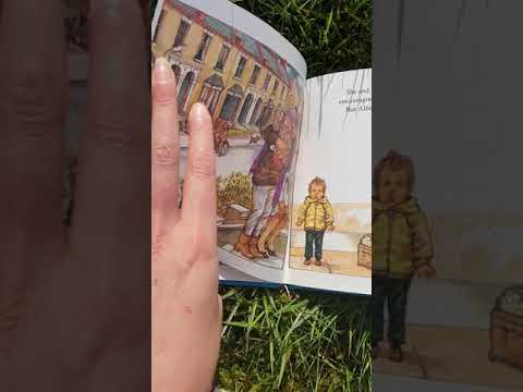 Story time with Miss Horton; Alfie gets in first.