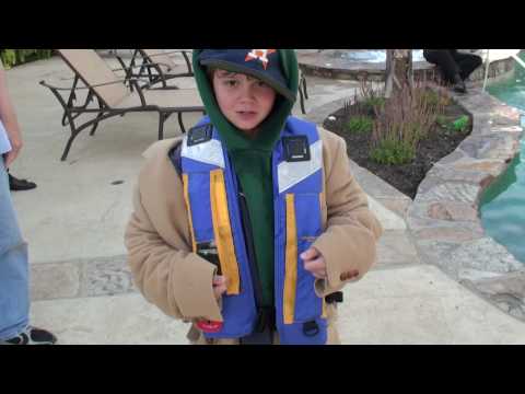 Testing of the Stearns west marine CO2 armed life jacket by a kid.