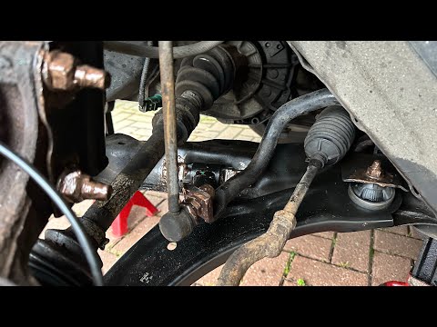 How to replace the front suspension arm of a Uk Nissan Qashqai Dualis J10 .