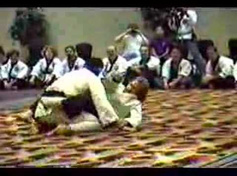 Chuck Norris & Carlos Machado grappling demo when Chuck was just starting BJJ