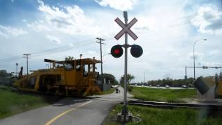 preview picture of video 'CN MOWs crossing McGilivray Blvd southbound, in Winnipeg, Manitoba'