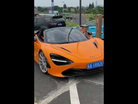 A convertible McLaren 720s: The co-pilot has never let everyone down, she is so beautiful. #McLaren