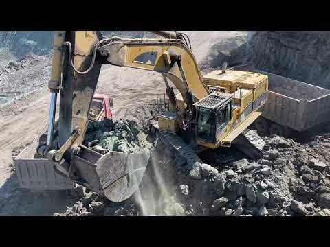 Caterpillar 385C Excavator Loading Mercedes And MAN Trucks - Ektor EPE