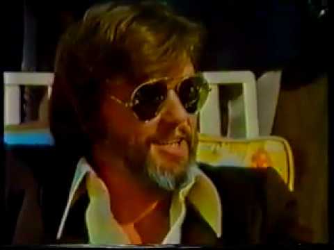 Gettin By High And Strange - Kris Kristofferson