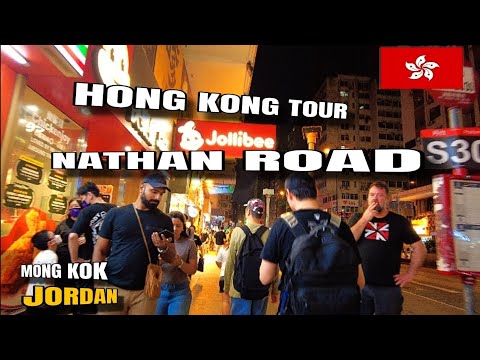Cenas da vida noturna Nathan Road de Mong kok à Jordânia / ponto turístico mais famoso de Hong Kong |4KHDR
