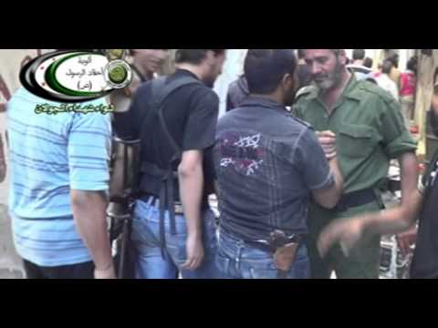 توجه عناصر لواء شهداء الجولان لمعركة السيطرة على حاجز الدوار في منطقة السيدة زينب في ريف دمشق