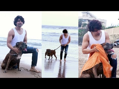 Gurmeet Choudhary Takes His Dog Out For A Walk At Juhu Beach
