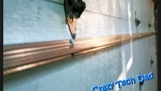 NEW! EZ How to fix a popping, buckling, or banging garage door, Easy!