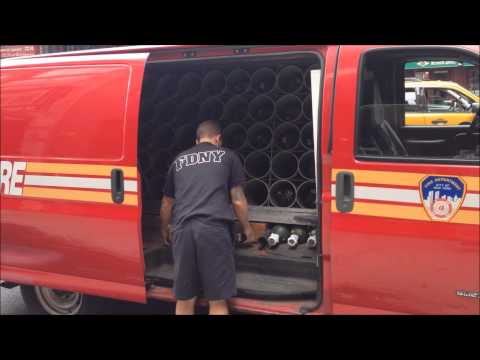 FDNY MASK SERVICES UNIT REPLACING USED AIR TANKS A FDNY LADDER 4 & FDNY ENGINE 54 FIREHOUSE.