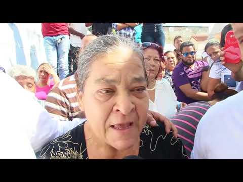 Reportaje sobre el entierro del bachatero Bolivar Peralta