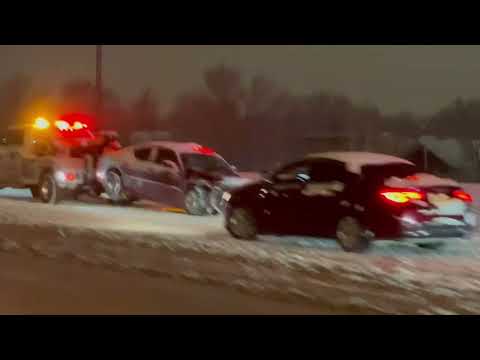 Snow plows clearing icy roads in Amarillo, Texas