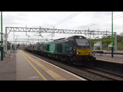 DRS 68008 passes Milton Keynes Central with a convoy 28/04/22