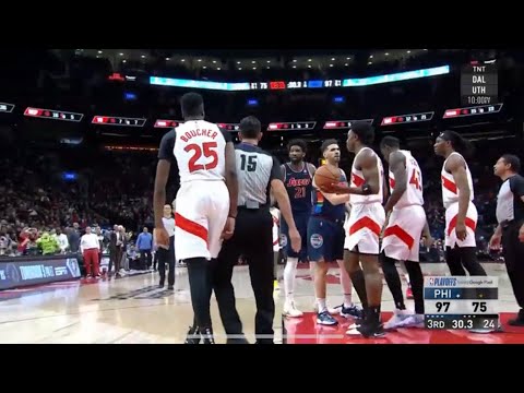 Joel Embiid and Chris Boucher get into it! Raptors fans have some choice words!