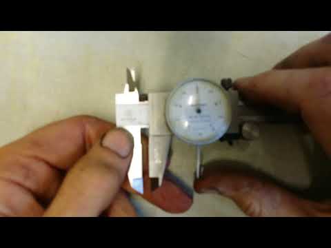 Resetting zero on a Mitutoyo dial caliper using the "special " tool.