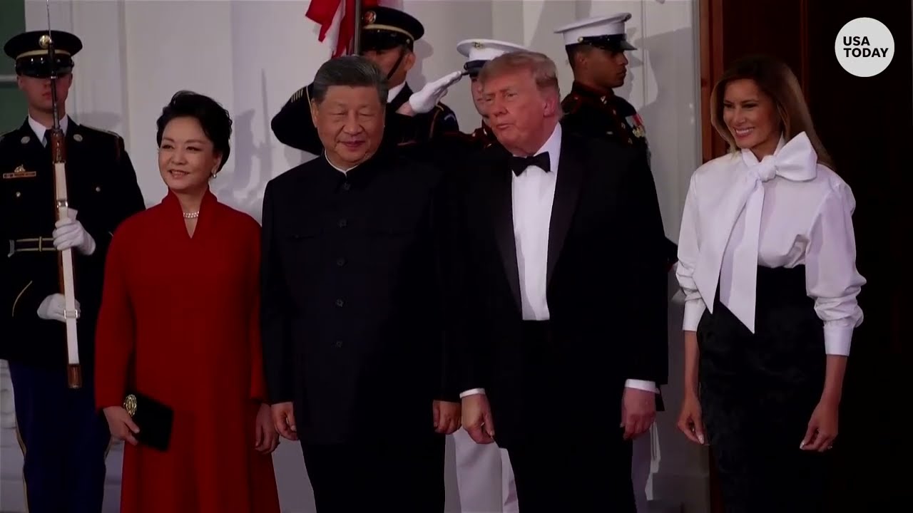 Donald Trump greets Xi Jinping at White House for state dinner amid sounds of protest from DC street
