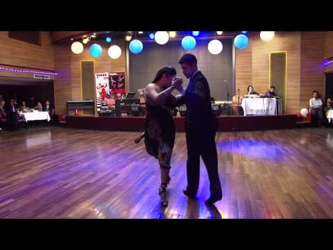  Sebastian Jimenez  and  Maria Ines Bogado  are  dancing  to  a  tango  at  Shanghai Tango Marathon  in  2013